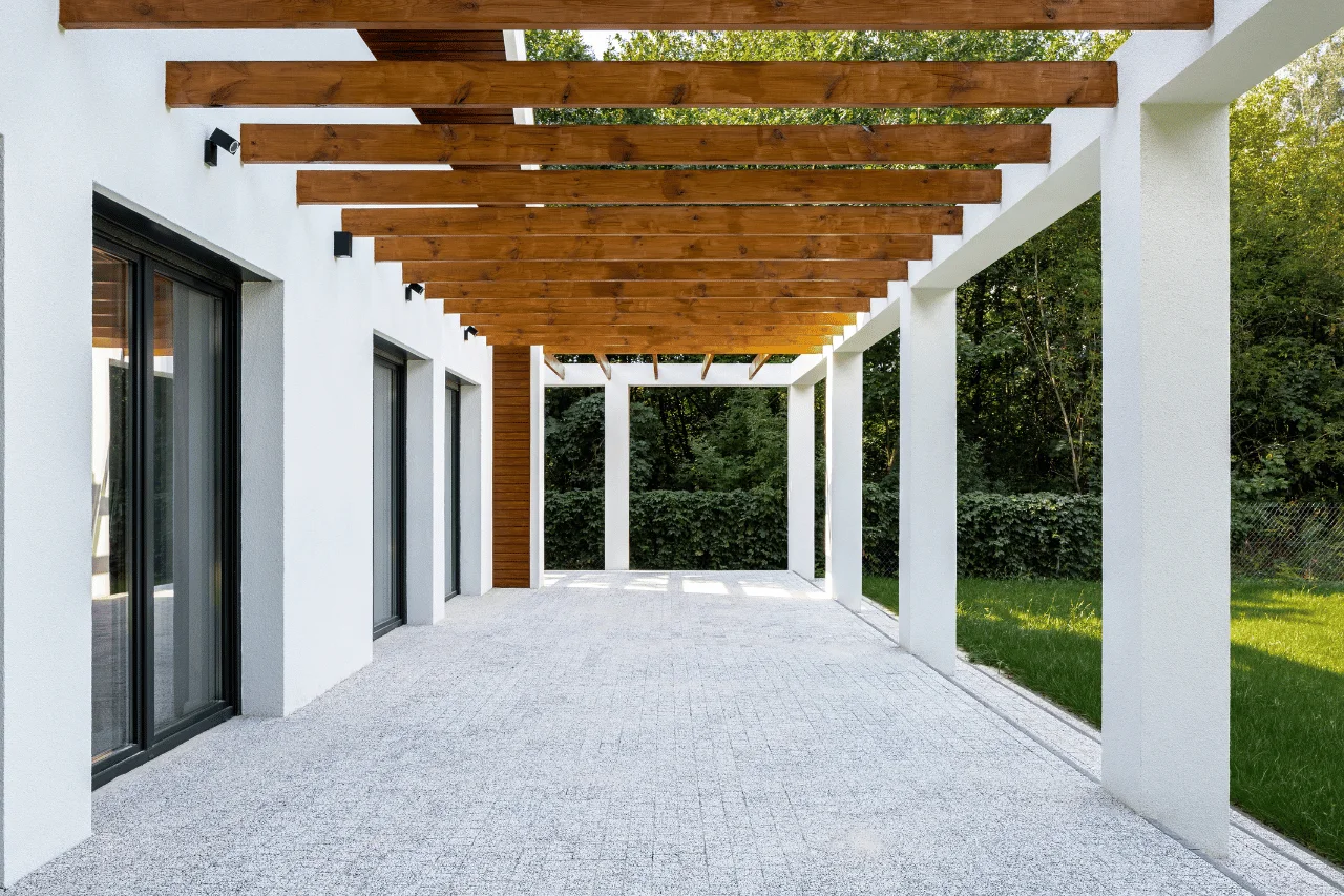 Covered outdoor patio beside a home